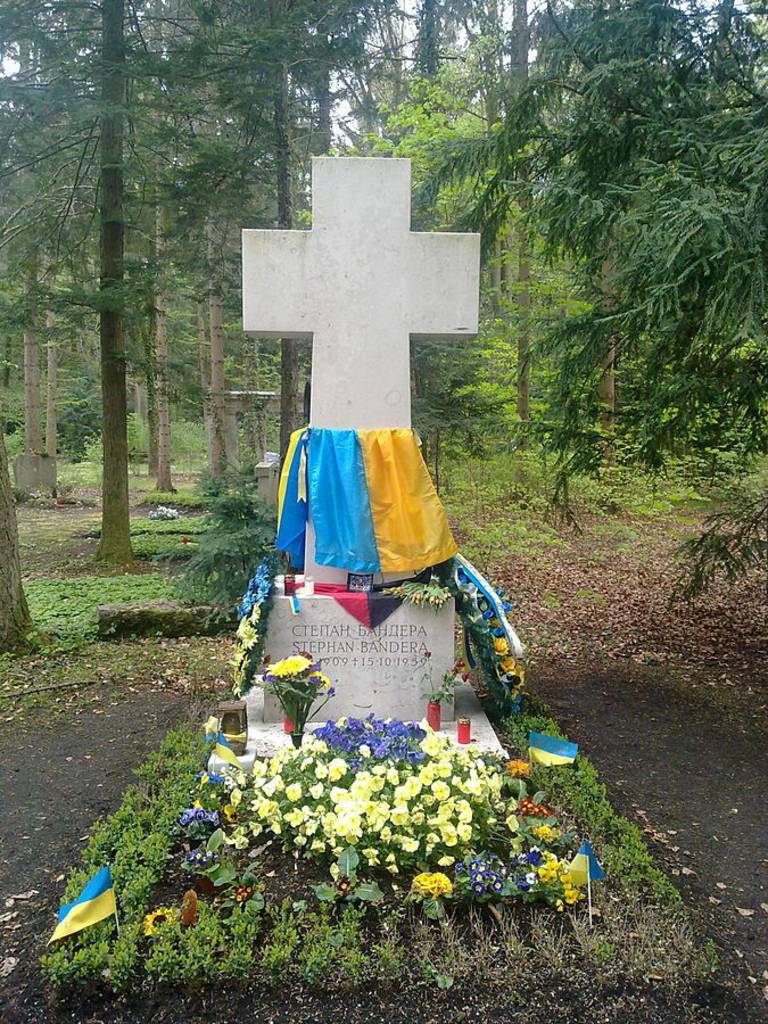 Commemoration of Stepan Bandera with flowers at his grave at Munich Waldfriedhof, grave number 043-W-10.